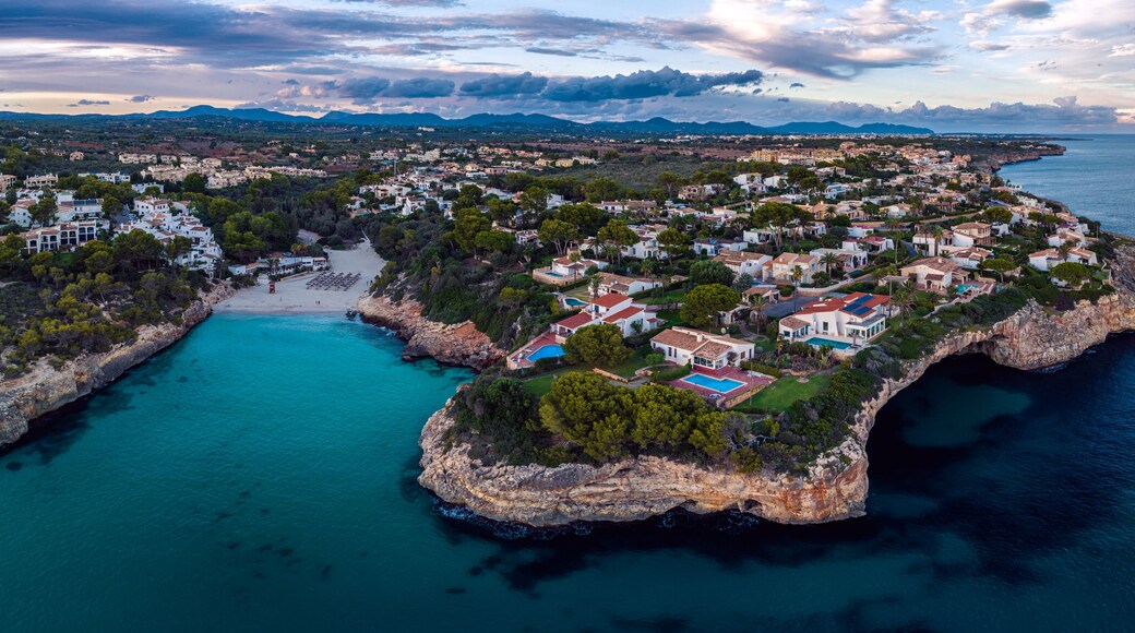 Sunset over Cala Anguila-Cala Mendia from a drone, Porto Cristo, Majorca, Spain, Europe