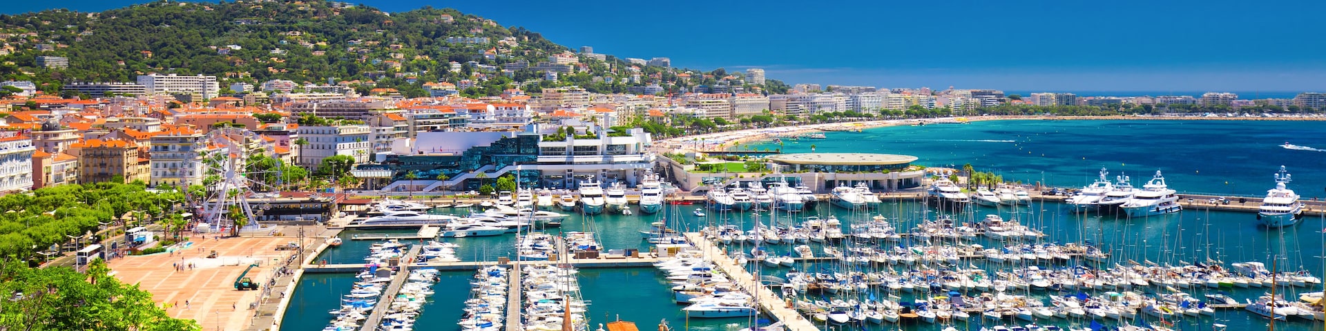 Coastline view on french riviera with yachts in Cannes city center.