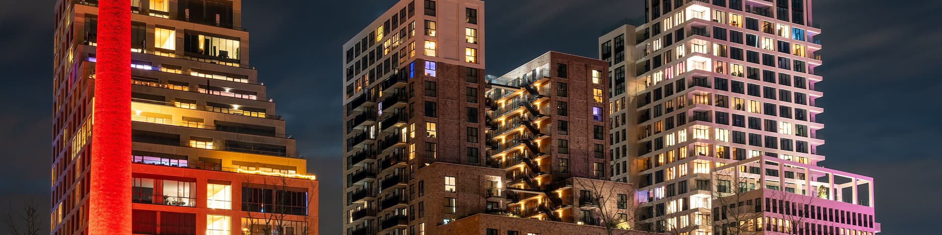 Eindhoven Strijp S district at night, modern buildings at the former industrial terrain