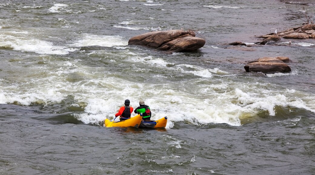 Two rafters approaching rapids on the James River in Richmond, Virginia on a bitter cold winter afternoon.
