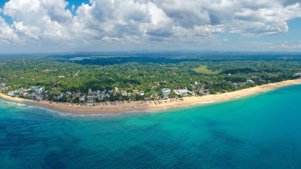 Aerial view of the popular beaches of Hikkaduwa and Thiranagama, the best places for surfing and swimming. Island Sri Lanka