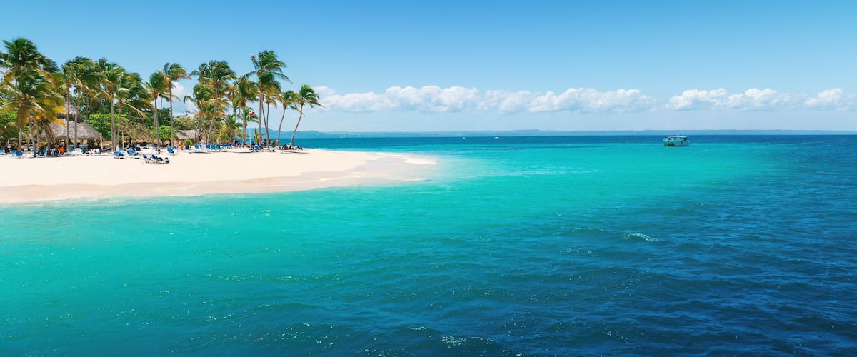 Aerial view over Caribbean Sea and Exotic Palm trees on Bacardi Island Cayo Levantado Samana Bay Dominican Republic