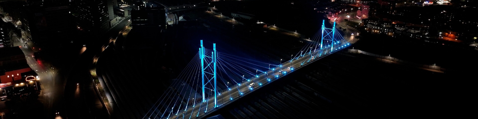 Mandela Bridge At Johannesburg In Gauteng South Africa. Night Scape Town. Illuminated Cable Stayed Bridge. Johannesburg At Gauteng South Africa. Landmark Bridge. Colorful Skyline.