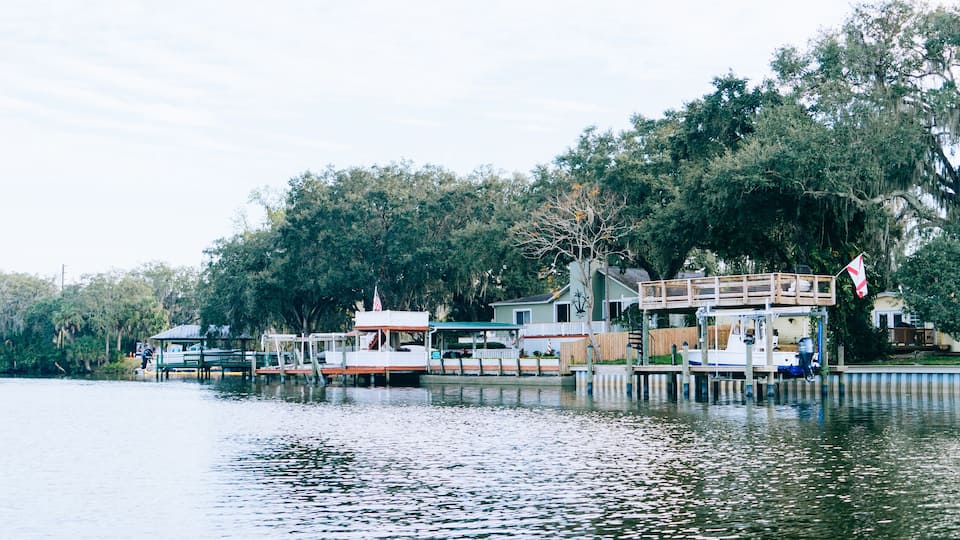 Riverview, Florida, USA - 02 10 2022: River view house and dock along Little Manatee River