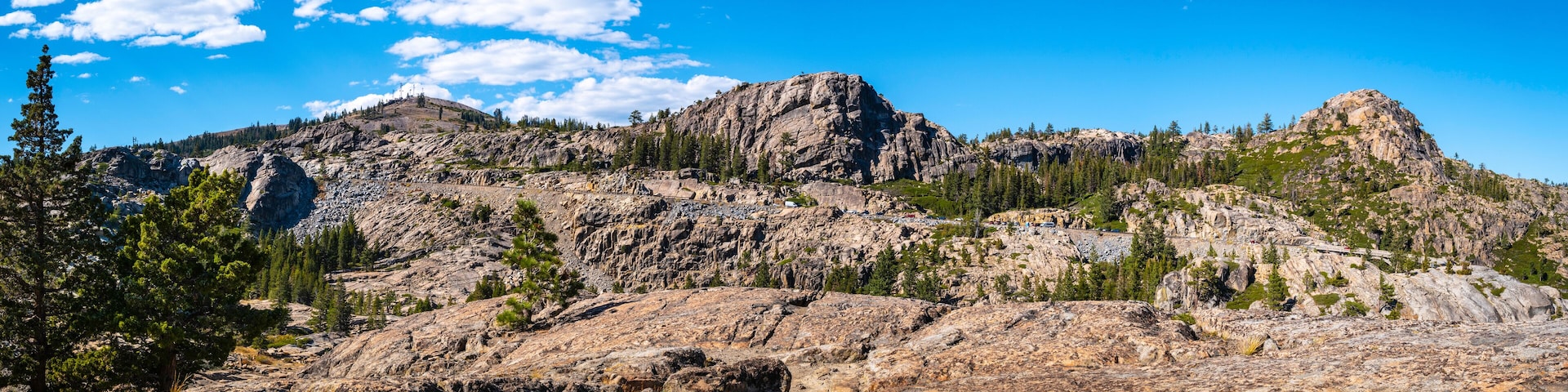 Autumn landscape panorama over the rugged terrain of the rocky hill at Donner Summit, Placer County, Northern California. off the historic US Route 40 near Lake Tahoe