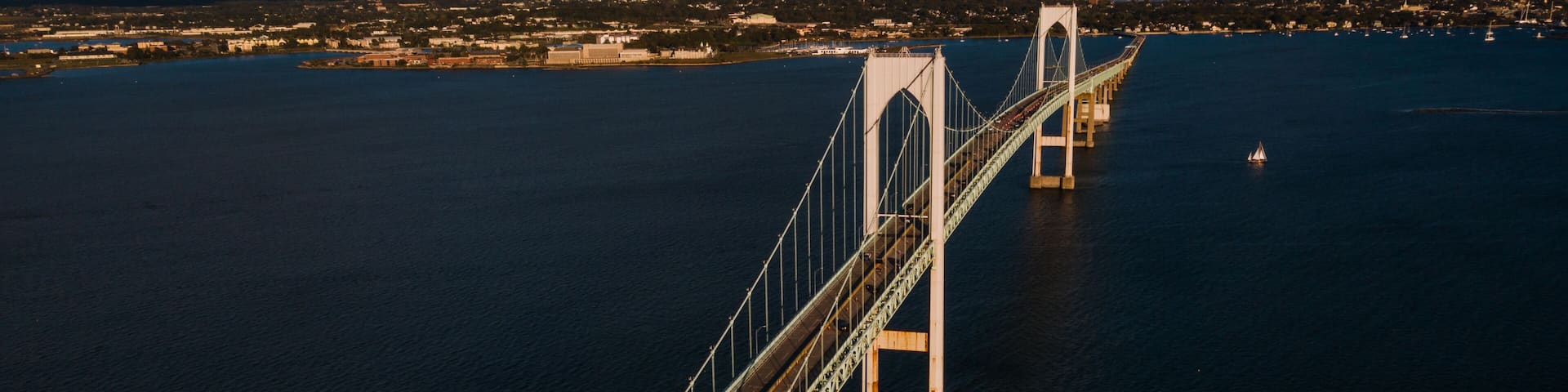 Late Evening Aerial Views of Historic Newport Suspension Bridge - East Passage Narragansett Bay - Rhode Island