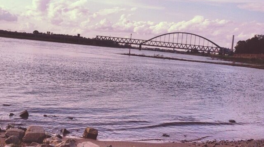 This is really the widest river i have ever seen(though i know that there are many other more wider rivers than this one) anyway, i find this place which has really amazing view to this bridge,i guess from there the view right to the water would be better but unfortunately i did not have opportunity to see it .