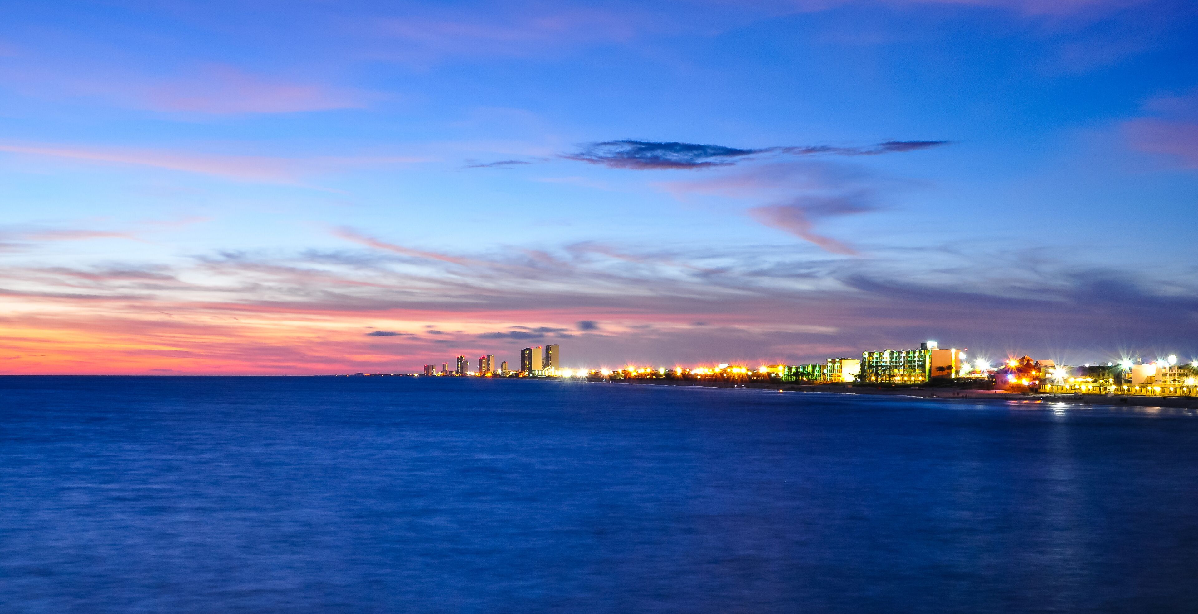 coastal skyline of panama city, florida at dusk