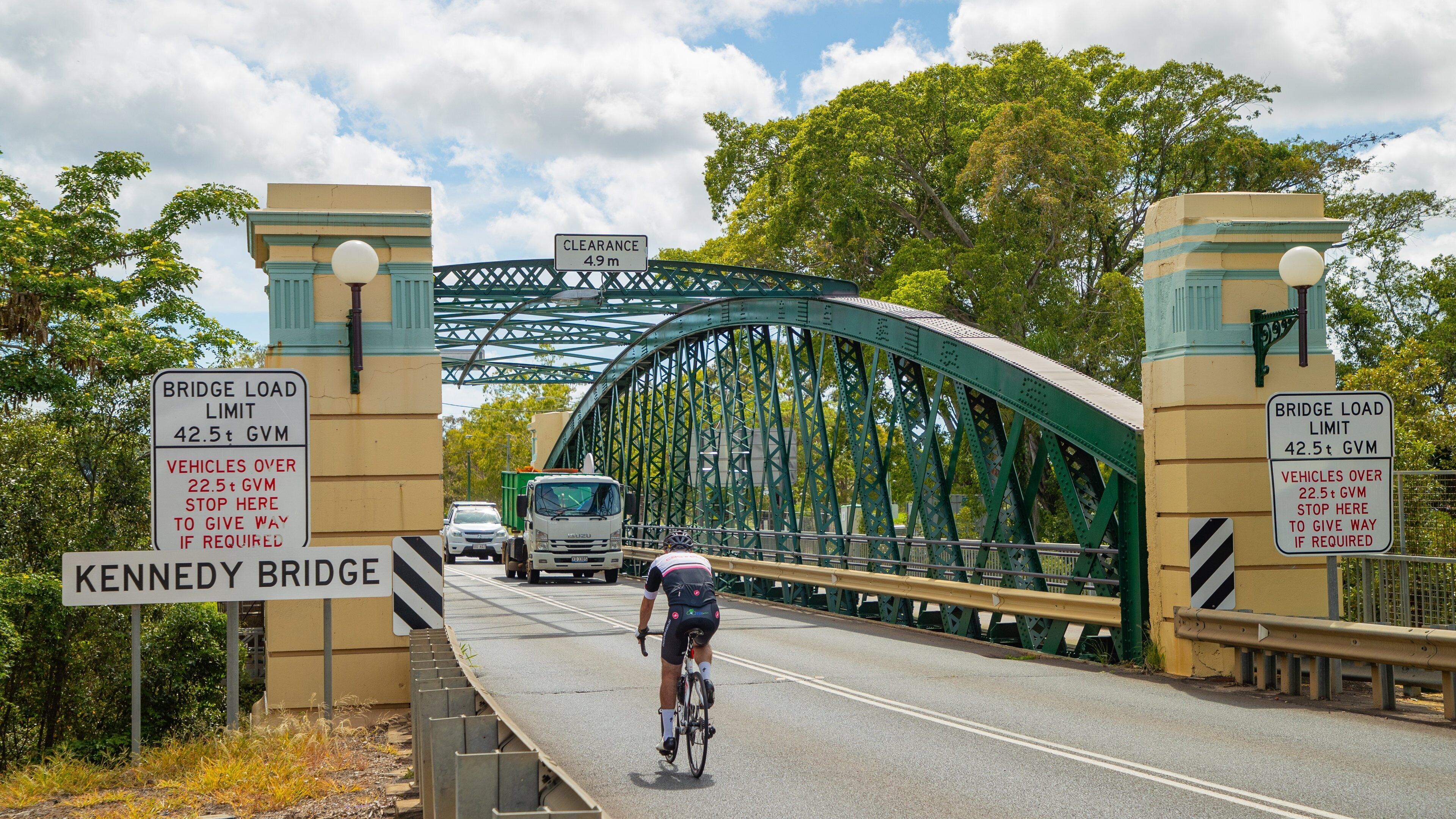 Bundaberg Central showing cycling, a bridge and signage