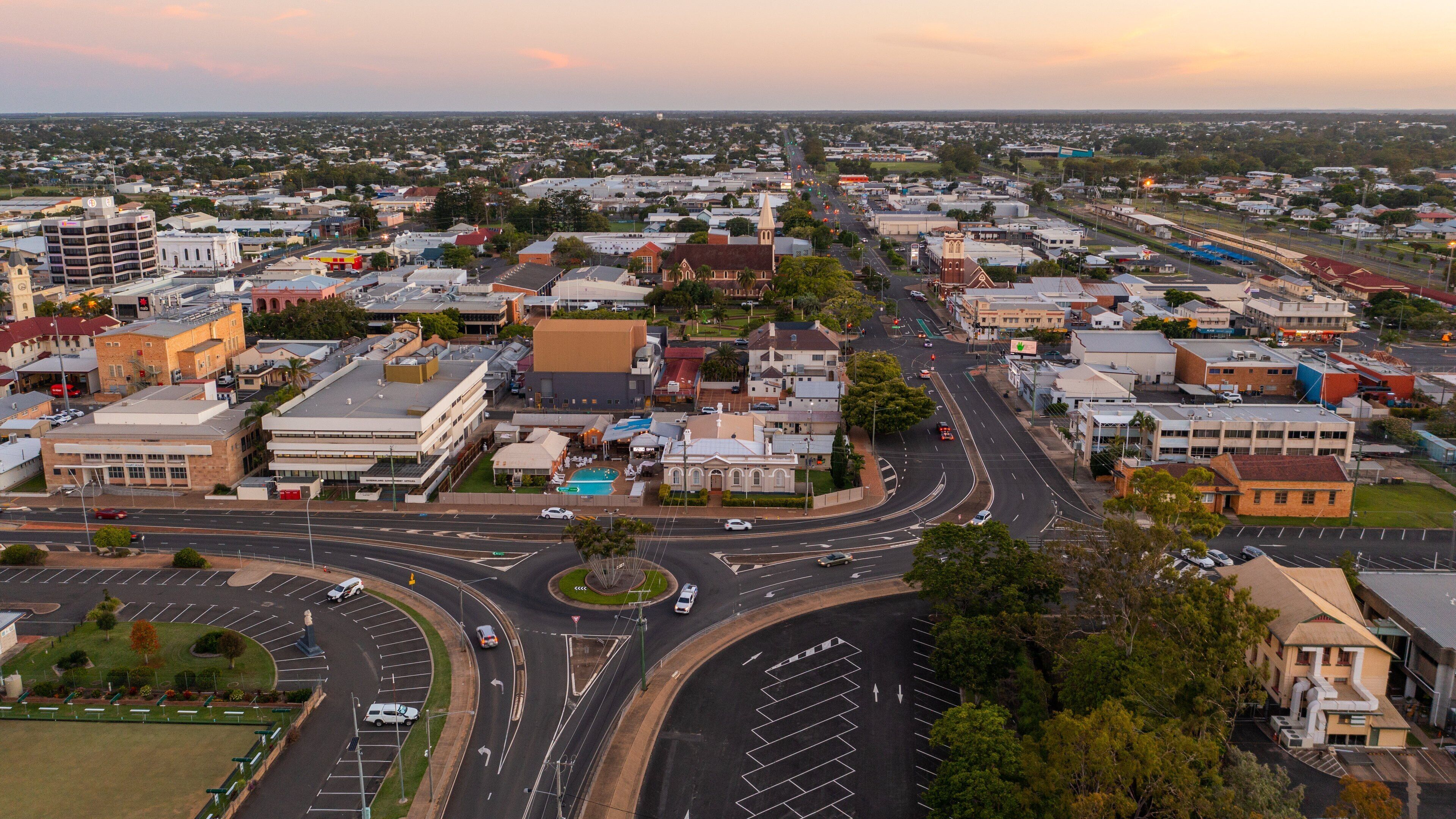 Bundaberg Central featuring a sunset, landscape views and a small town or village