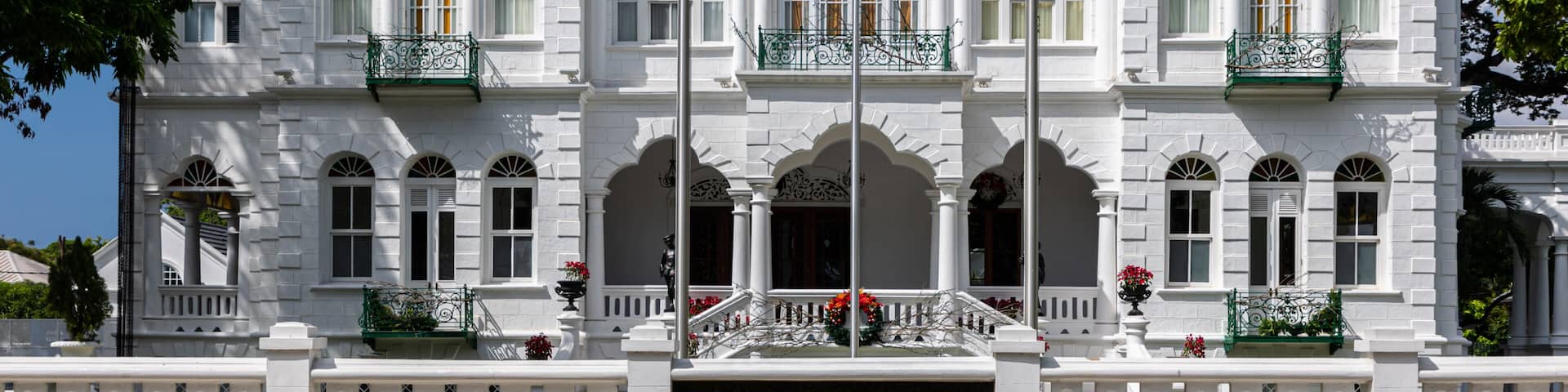 White Hall, office of the Prime Minister of Trinidad and Tobago, Port of Spain city, Caribbean. One of the Magnificent Seven, Whitehall, originally Rosenweg. National flag flying