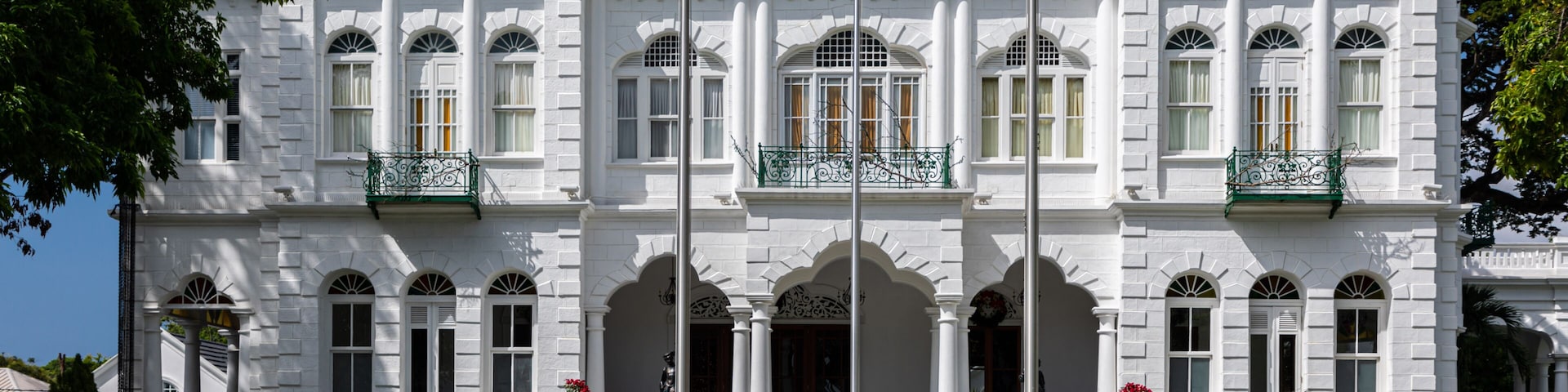 White Hall, office of the Prime Minister of Trinidad and Tobago, Port of Spain city, Caribbean. One of the Magnificent Seven, Whitehall, originally Rosenweg. National flag flying