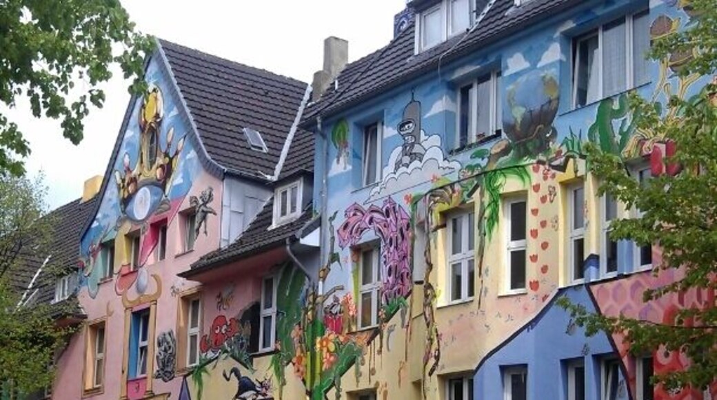 Kiefernstrasse became infamous in the early 1980's for squatting. Nowadays the squatters live in regular tenancies, yet the street remains a colorful display of living counterculture.
