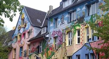 Kiefernstrasse became infamous in the early 1980's for squatting. Nowadays the squatters live in regular tenancies, yet the street remains a colorful display of living counterculture.