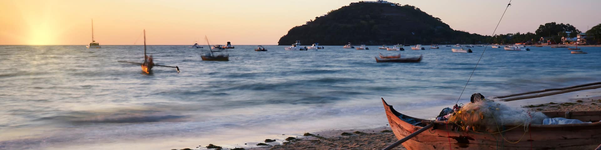 Madirokely beach in Ambatoloaka on Nosy Be (Nossi Be) Island, Madagascar at sunset