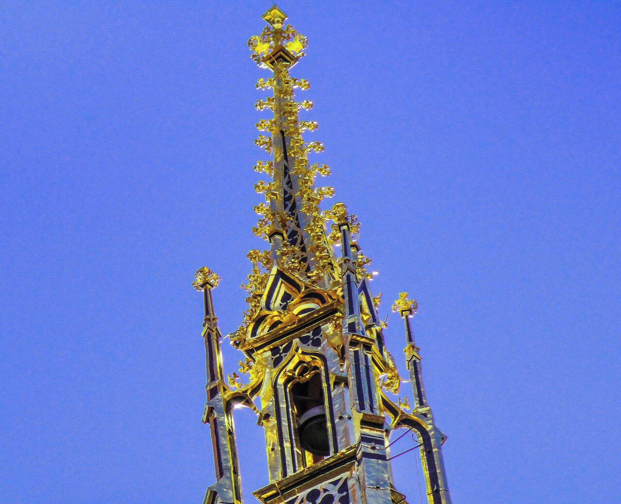 Glittering bell tower in Town Hall at Basel.