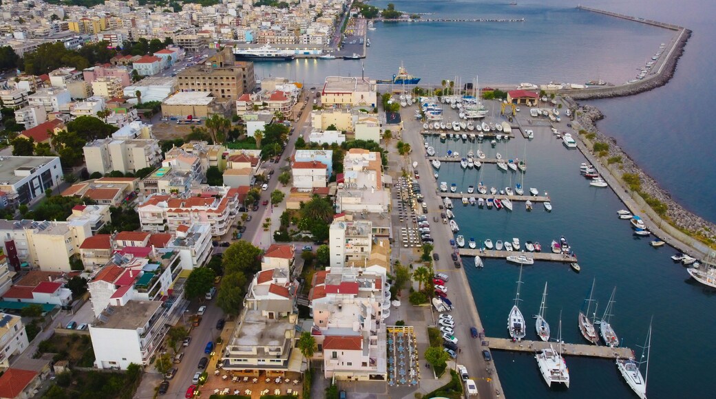 Aerial view of Kalamata marina with luxury yachts in line at dusk