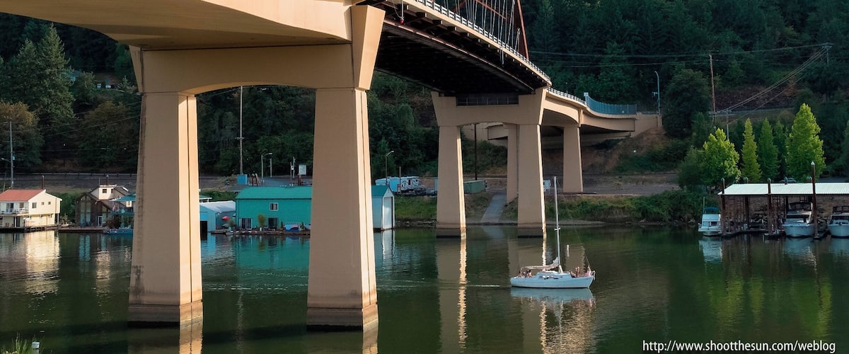 This is the second version of a bridge which spans the Multnomah Channel between Highway 30 North and West of Portland, Oregon and Sauvie Island.  The first version had to be scrapped early in this century when it was discovered that cracks running through it would eventually lead to its collapse.
It's a young bridge, only seven years old, in fact, but it comes with all the amenities.  It should, it cost $43 million to build.  But it will last the county many, many years.
The first few hours of its history were some of the most exciting.  It was floated into place right down the Multnomah Channel, part of a series of such rapid-replacement events throughout the state during that year.
This is the bridge you take to get to the trails at Warrior Point and Oak Island, two of the places from which I've posted discoveries in the past.  There's a lot more to do on that island besides chase after wildlife -- farm fresh fruit stands, country stores, bike paths, beaches.  It's a real gem, more or less in the heart of this great Pacific Northwest metropolis.
And it's just down the road from the St. Johns Bridge, that other iconic marvel featured in the series "Grimm."
https://en.wikipedia.org/wiki/Sauvie_Island_Bridge