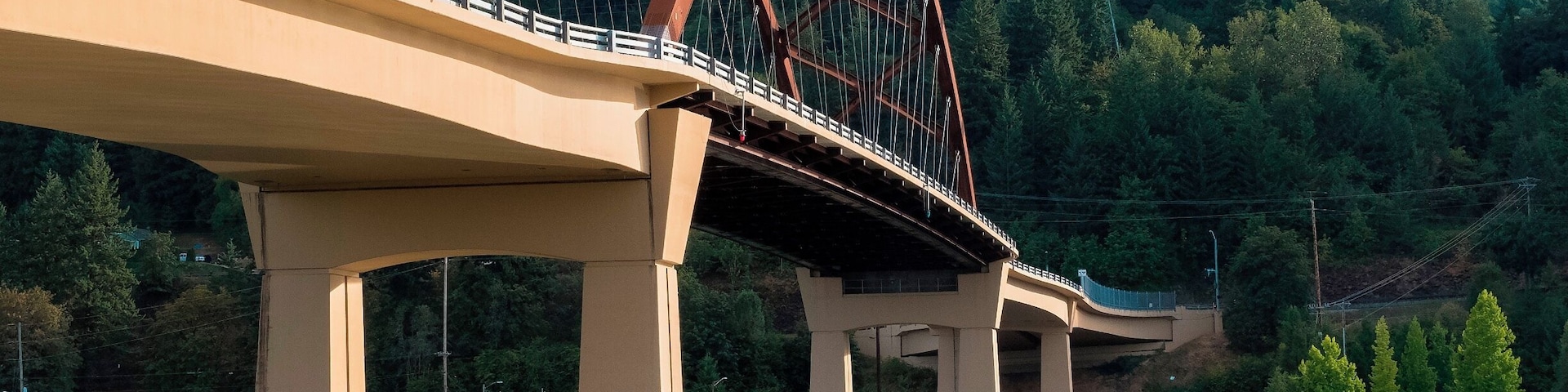 This is the second version of a bridge which spans the Multnomah Channel between Highway 30 North and West of Portland, Oregon and Sauvie Island. The first version had to be scrapped early in this century when it was discovered that cracks running through it would eventually lead to its collapse.
It's a young bridge, only seven years old, in fact, but it comes with all the amenities. It should, it cost $43 million to build. But it will last the county many, many years.
The first few hours of its history were some of the most exciting. It was floated into place right down the Multnomah Channel, part of a series of such rapid-replacement events throughout the state during that year.
This is the bridge you take to get to the trails at Warrior Point and Oak Island, two of the places from which I've posted discoveries in the past. There's a lot more to do on that island besides chase after wildlife -- farm fresh fruit stands, country stores, bike paths, beaches. It's a real gem, more or less in the heart of this great Pacific Northwest metropolis.
And it's just down the road from the St. Johns Bridge, that other iconic marvel featured in the series "Grimm."
https://en.wikipedia.org/wiki/Sauvie_Island_Bridge