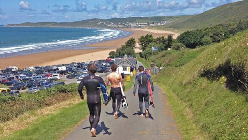 Surfing at Putsborough Sands