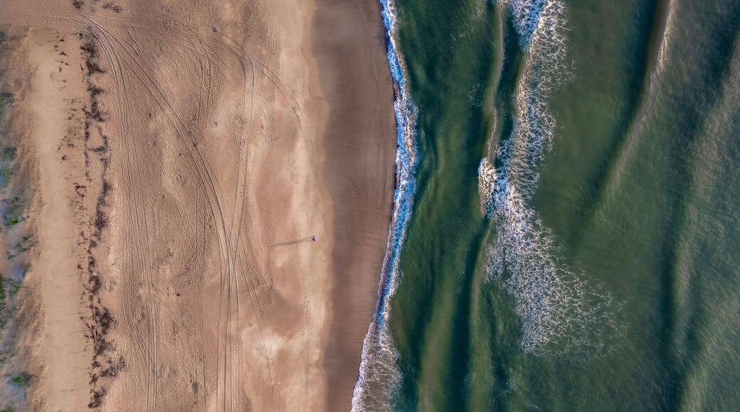 Aerial view of beautiful sandy beach and blue ocean waves, South Ponte Vedra Beach, Florida, United States.