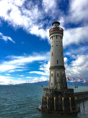 Lindau Lighthouse, the southernmost lighthouse of Germany, at the harbour entrance of Lindau, Lake Constance