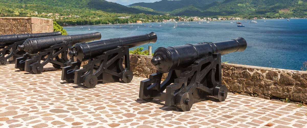 A row of cannons at Fort Shirley in Cabrits National Park near Portsmouth on the Caribbean island nation of Dominica