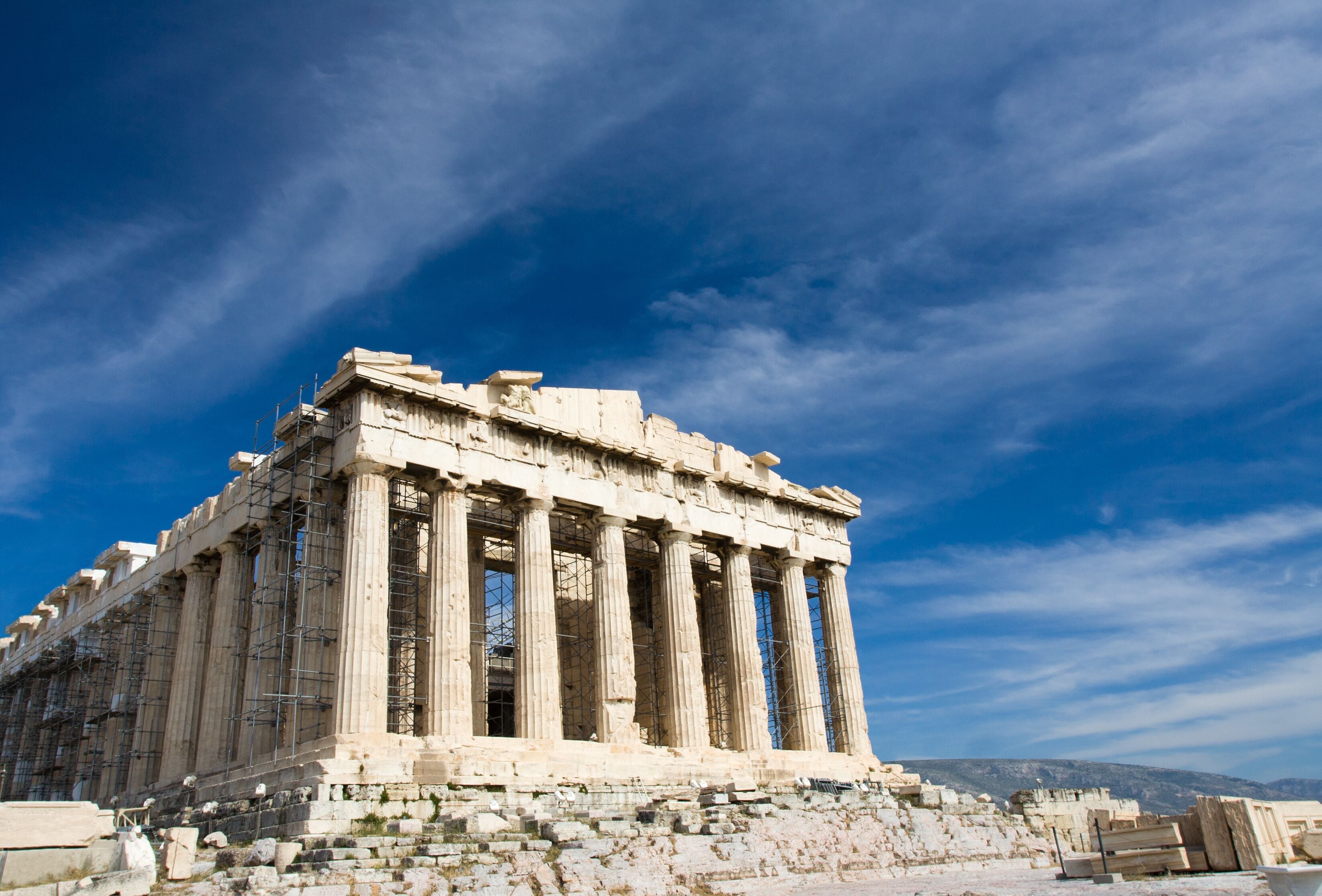 Ancient Parthenon in Acropolis Athens Greece on blue sky backgro