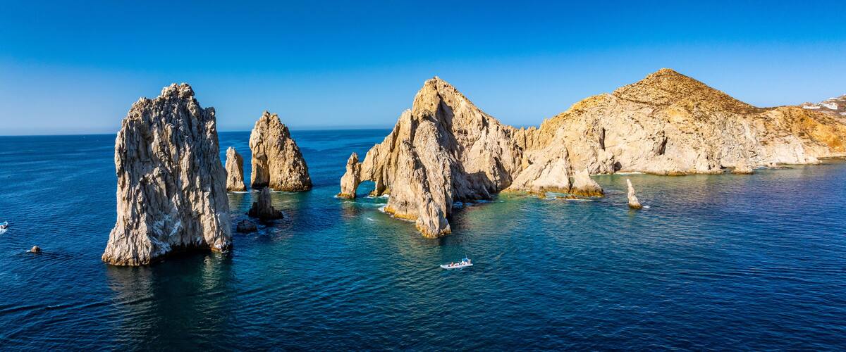 El Arco de Cabo San Lucas, Baja California Sur, Mexico, panoramic aerial view of Lands End, the southernmost tip of the Baja California peninsula, located in the Pacific Ocean - with 1 tourist boat