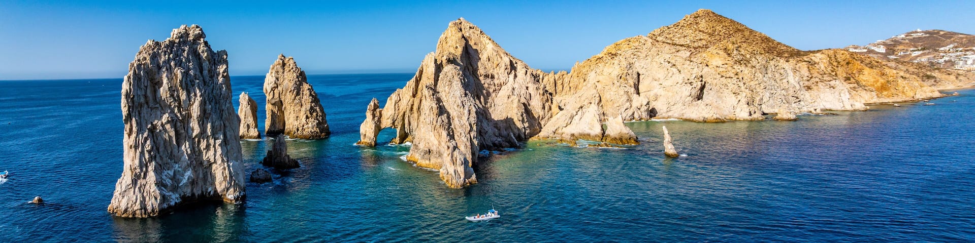 El Arco de Cabo San Lucas, Baja California Sur, Mexico, panoramic aerial view of Lands End, the southernmost tip of the Baja California peninsula, located in the Pacific Ocean - with 1 tourist boat