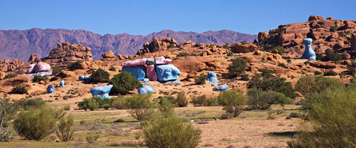 4 km outside of Tafraoute, the Belgian painter Jean Veran have made his stunning art project. The painted stone formations come as a surprise to you and are a contrast to the landscapes own golden red colors. Jean Veran helps you to experience the beauty of the landscape in a new, and for my part, stronger way. Some places the whole mountain is painted in blue. My personal opinion is that his artistic expression is strongest when he is limited to only paint single stones and restricted areas. Restricting himself makes the art more obviously and the contrast to nature is more exciting. Read more at: http://www.travelwithallsenses.com/land-art-tafraoute-morocco/