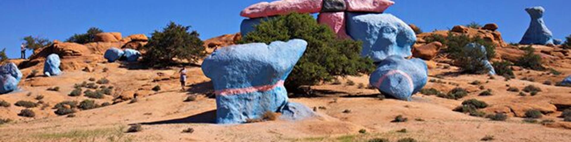 4 km outside of Tafraoute, the Belgian painter Jean Veran have made his stunning art project. The painted stone formations come as a surprise to you and are a contrast to the landscapes own golden red colors. Jean Veran helps you to experience the beauty of the landscape in a new, and for my part, stronger way. Some places the whole mountain is painted in blue. My personal opinion is that his artistic expression is strongest when he is limited to only paint single stones and restricted areas. Restricting himself makes the art more obviously and the contrast to nature is more exciting. Read more at: http://www.travelwithallsenses.com/land-art-tafraoute-morocco/