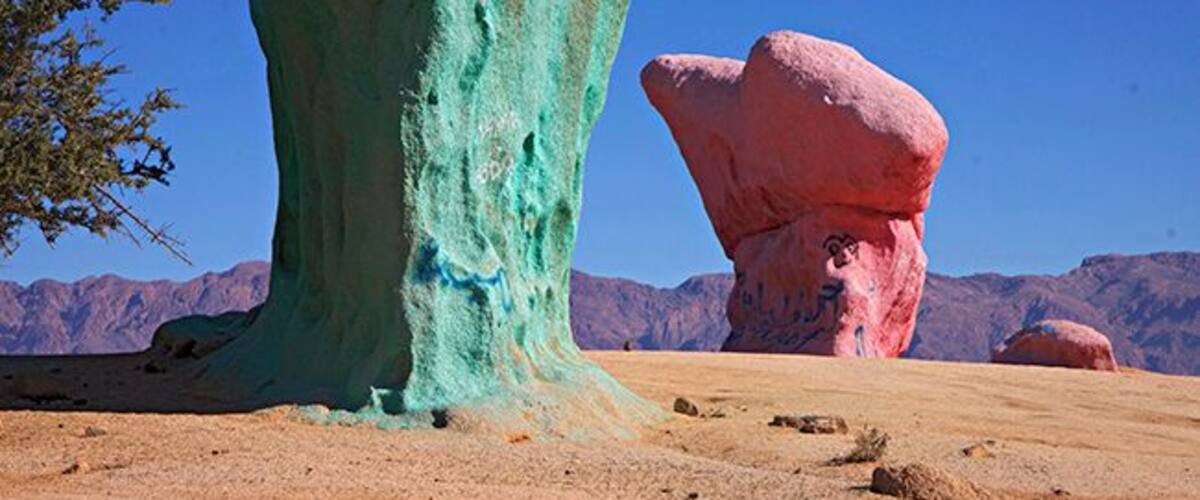 4 km outside of Tafraoute, the Belgian painter Jean Veran have made his stunning art project. The painted stone formations come as a surprise to you and are a contrast to the landscapes own golden red colors. Jean Veran helps you to experience the beauty of the landscape in a new, and for my part, stronger way. Some places the whole mountain is painted in blue. My personal opinion is that his artistic expression is strongest when he is limited to only paint single stones and restricted areas. Restricting himself makes the art more obviously and the contrast to nature is more exciting. Read more at: http://www.travelwithallsenses.com/land-art-tafraoute-morocco/