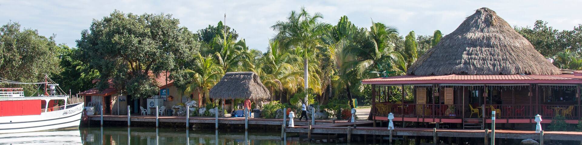 Placencia, Belize. Roberts Grove Resort marina with master dive boat, restaurant, protected harbor.