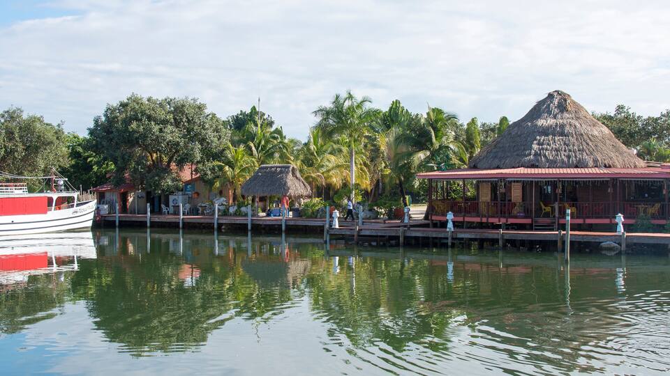Placencia, Belize. Roberts Grove Resort marina with master dive boat, restaurant, protected harbor.