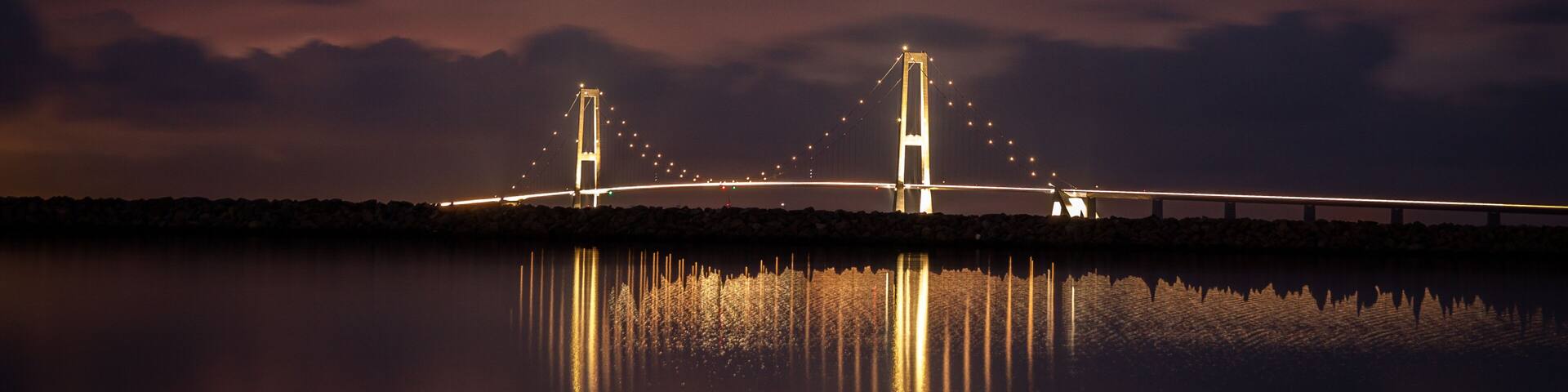 The Great Belt Bridge illuminated at night