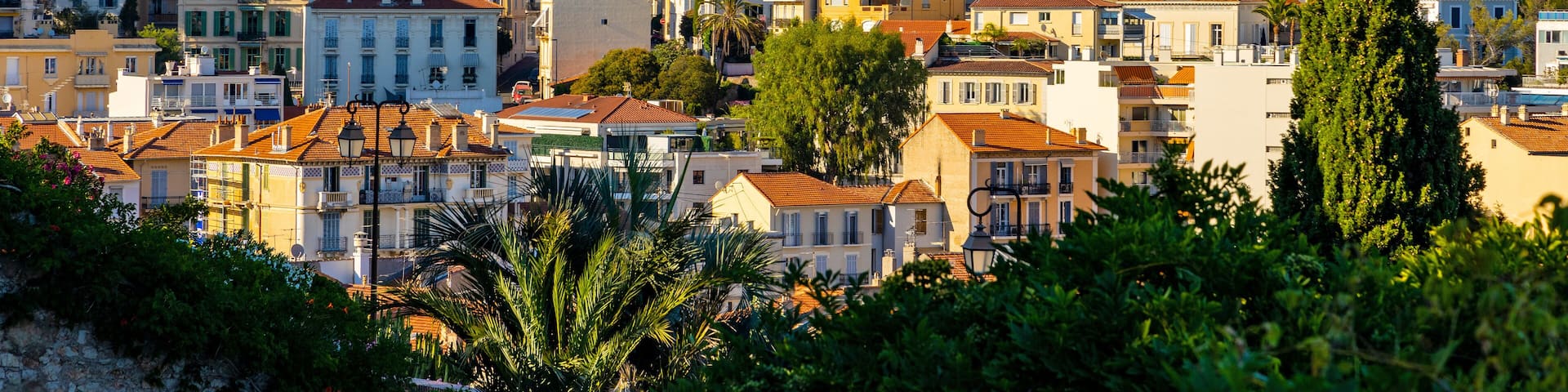 Panoramic view of Cannes city center with Carnot quarter seen from old town Castle Hill on French Riviera of Mediterranean Sea in France