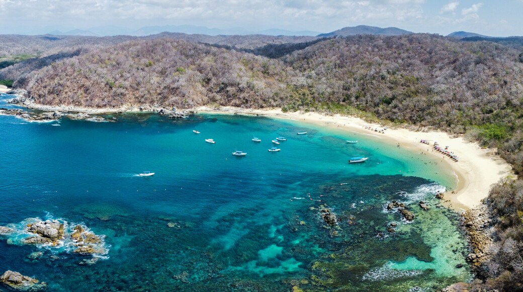 4k aerial panoramic view of huatulco oaxaca mexico beach summer spring national park sea landscape la india beach