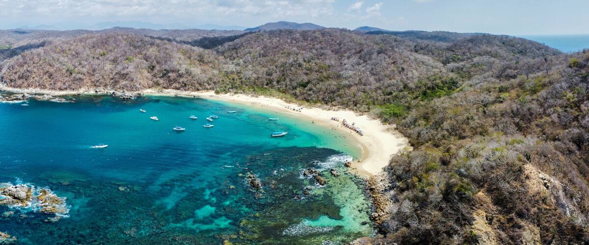 4k aerial panoramic view of huatulco oaxaca mexico beach summer spring national park sea landscape la india beach