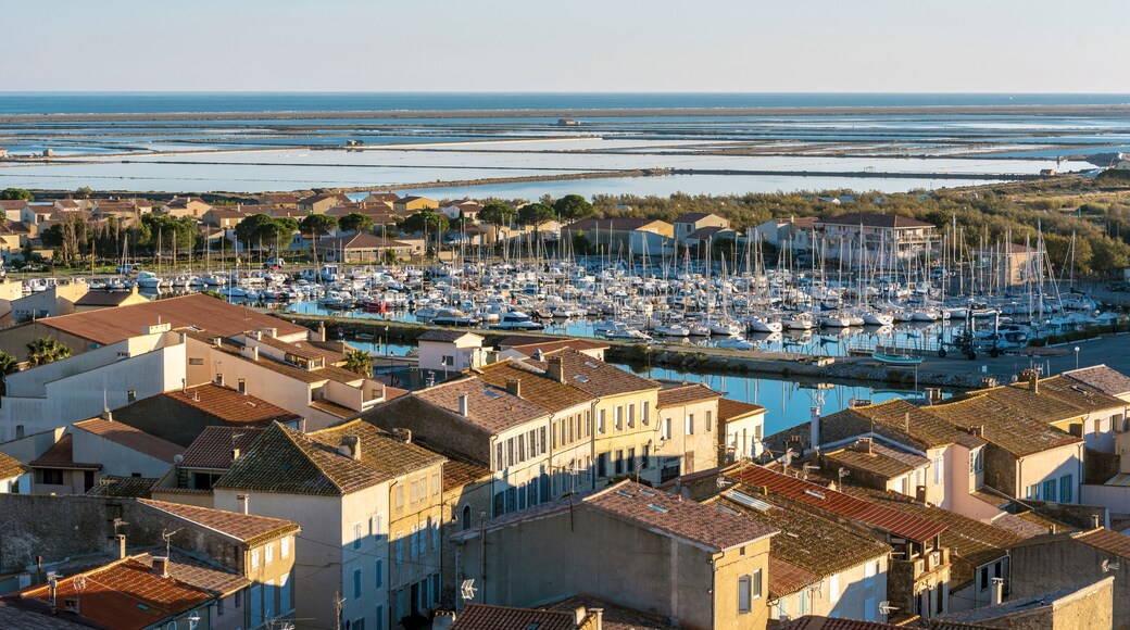 Marina of Gruissan town, Grazel Pond ant Mediterranean coastline as seen from Barberousse Tower. Occitanie, France.