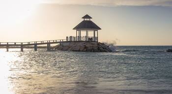 Oceanside Gazeebo Sunset Beach with Lifeguard Chair and Wind Flag