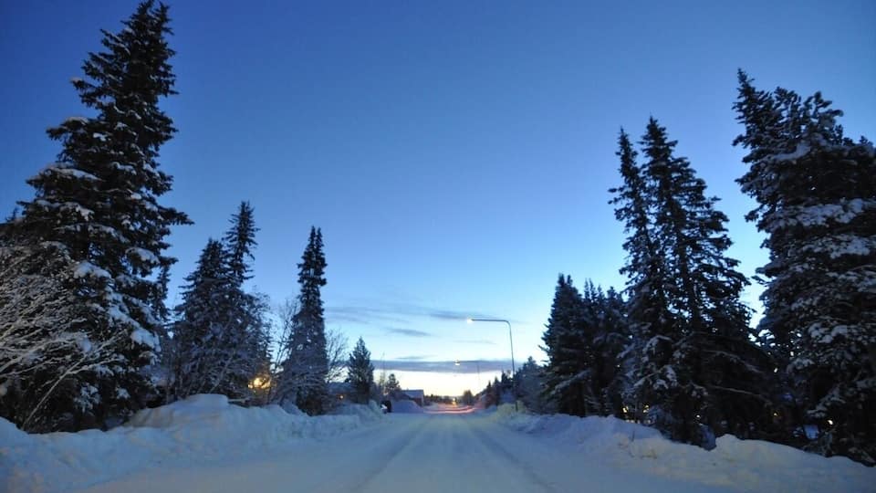 A snow filled road beside the Ice hotel in Jukkasjarvi, Northern Sweden, in the Arctic circle. Temperature was a warm (for Sweden standards) -25 degrees C.