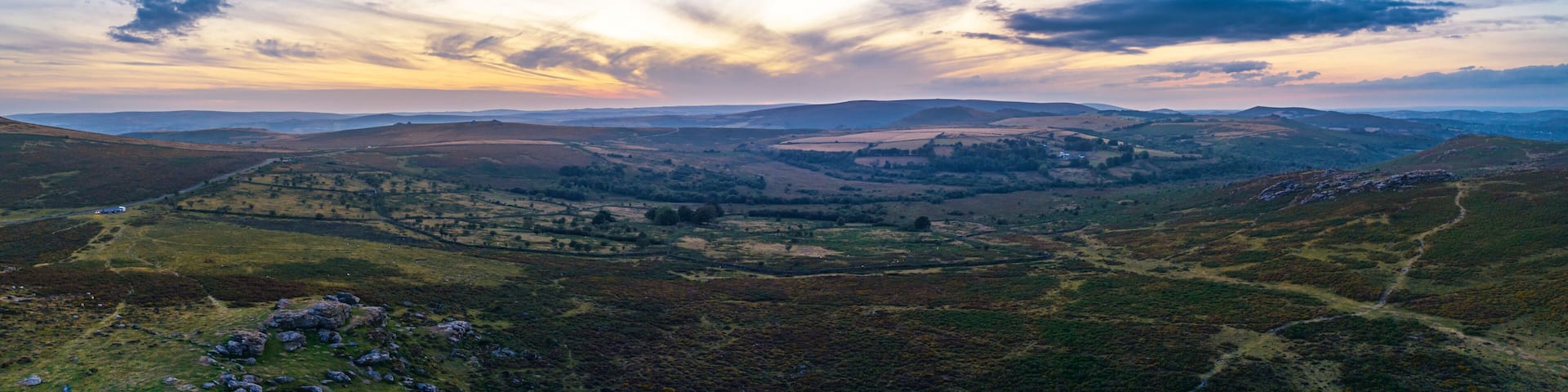 Sunset over Haytor Rocks from a drone, Dartmoor Park, Devon, England, Europe