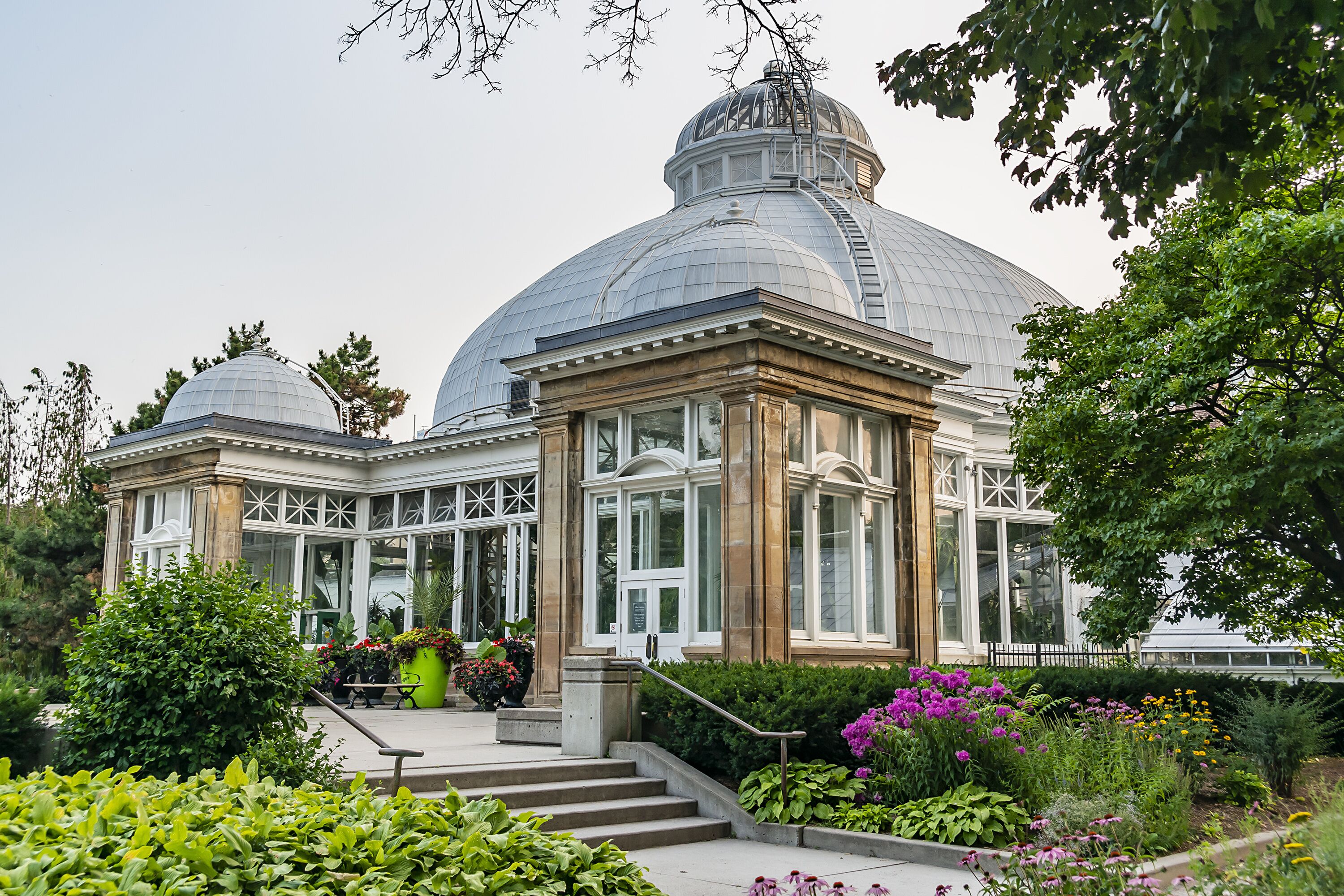 Allan Gardens (founded in 1858) - one of oldest public parks in Toronto with conservatory (greenhouse) and playground. Toronto, Ontario, Canada.