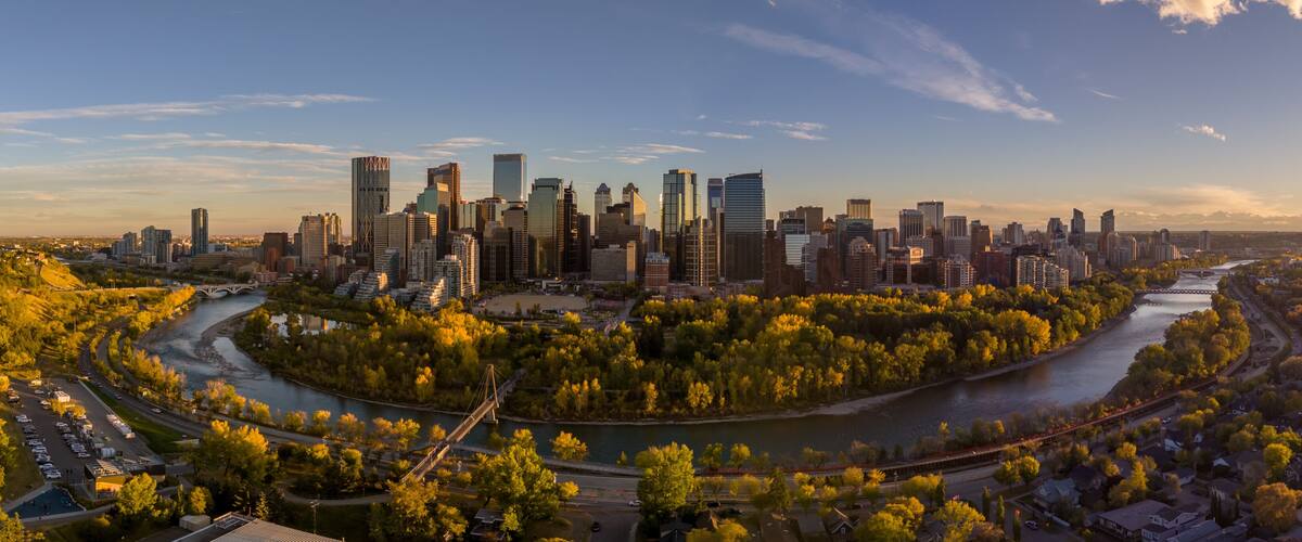 Aerial photograph of Calgary's downtown along the Bow River on a beautiful autumn evening.