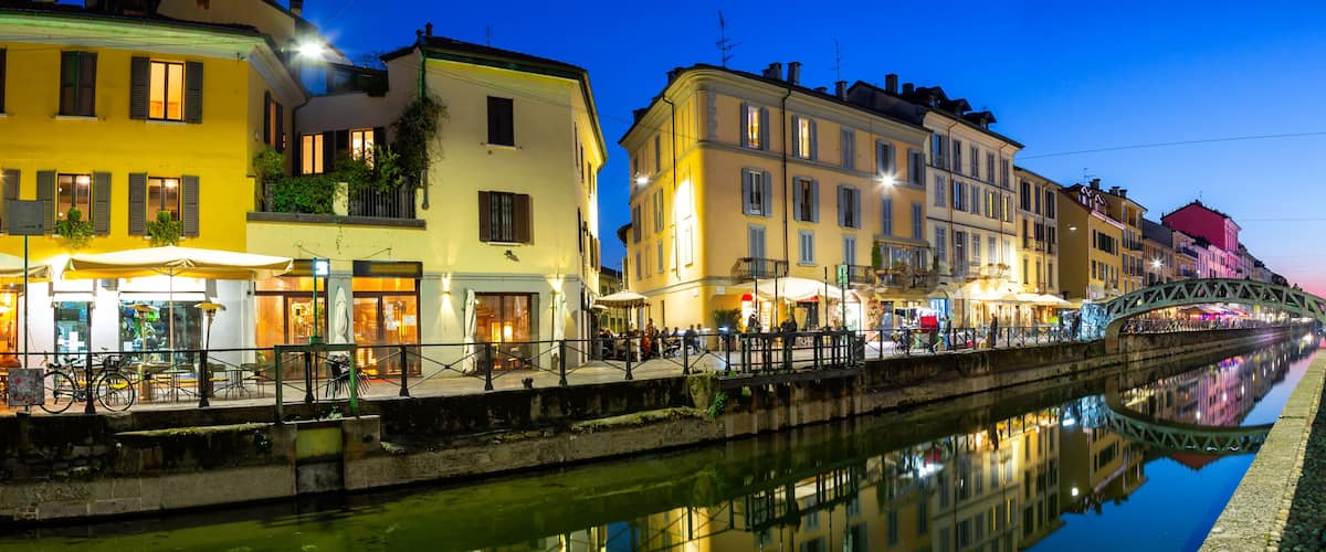 Milan Navigli Milano restaurant and bar district travel traveling holidays vacation town blue hour panorama in Italy