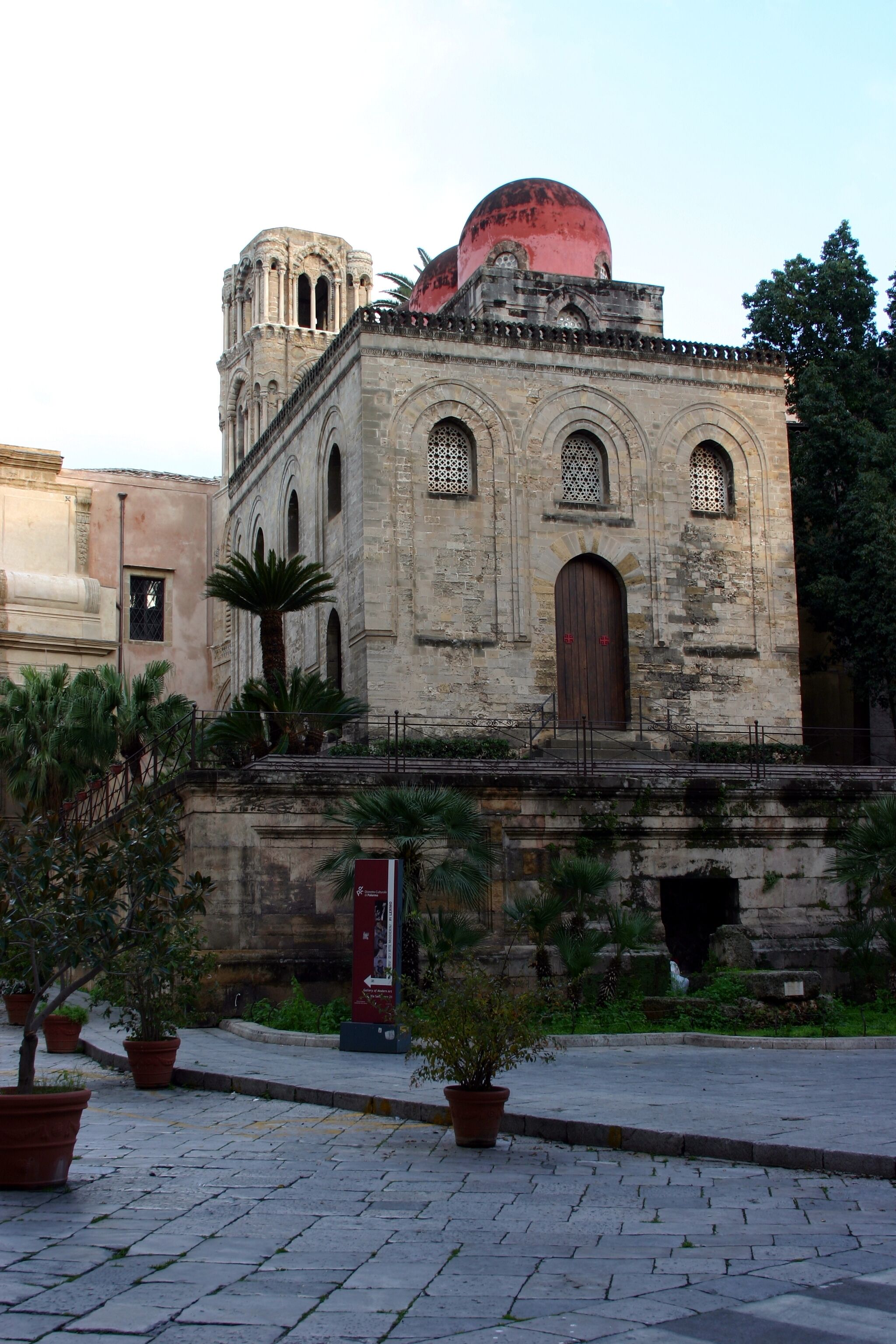 A historic building with a dome and arched windows.