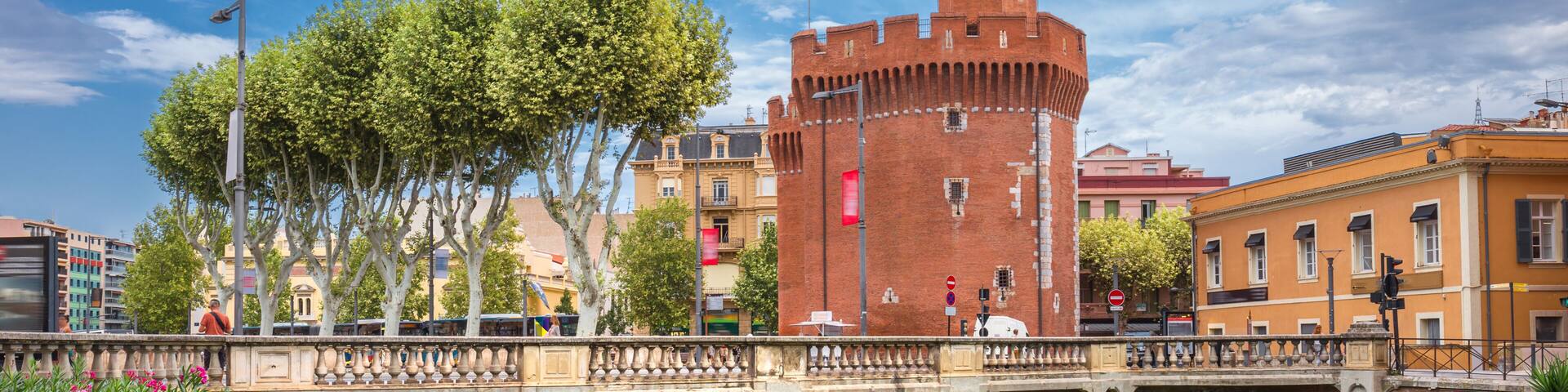 The bridge through the river Basse and Le Castillet - Perpignan, France