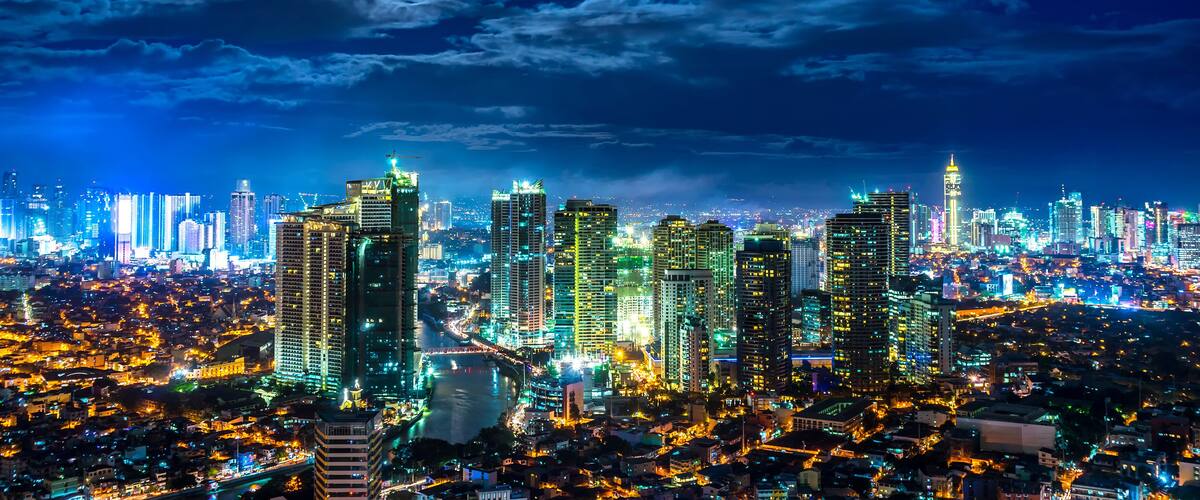 Rising Moon over the skyline of Metro Manila