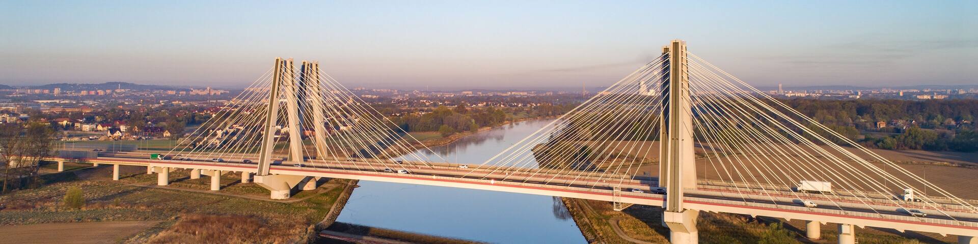 Double cable-stayed bridge in Krakow, Poland over the Vistula river at sunrise